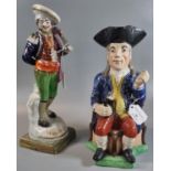 19th century Staffordshire pottery Toby Jug of a seated man with his beer together with another