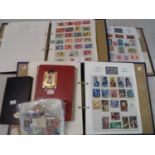 All World collection of mostly used stamps in three albums, two small stockbooks and loose, 100s. (