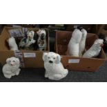 Two boxes containing Staffordshire seated fireside spaniels. (4 pairs) (B.P. 21% + VAT)
