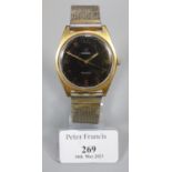 Omega gold plated gentleman's wristwatch with black face having double baton numerals, 'Omega ,