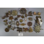 Collection of assorted British military cap badges, various, to include: Scottish, Leicestershire