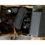 Box of assorted binoculars to include; a Tasco model no: 314 20x50 pair in case, Atchison London '