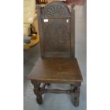 17th century style oak hall chair with moulded dome carved back on baluster turned stretcher and