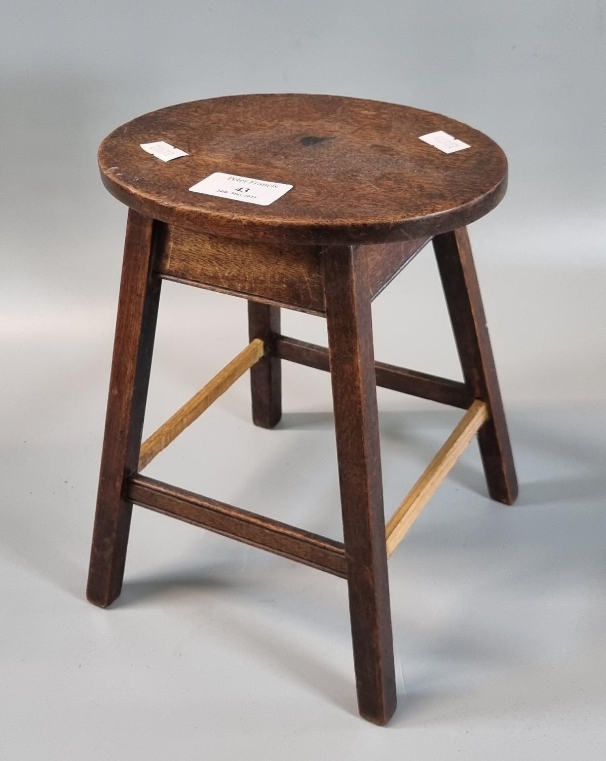 19th century miniature oval topped table on four legs. 19cm wide approx. (Stretchers replaced). (B.