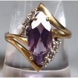 10ct gold diamond and purple stone ring. 3.4g approx. Ring size Q. (B.P. 21% + VAT)