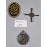 WWII German Winter medal together with a lapel badge for The German Labour Front (DAF) together with