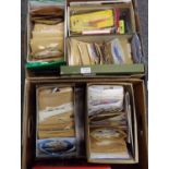 Two boxes of All World stamps sorted into envelopes in shoe boxes and stamp mounts together with