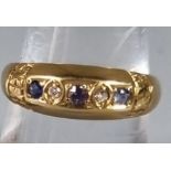 18ct five stone diamond and blue stone ring. 3g approx. Ring size O. (B.P. 21% + VAT)