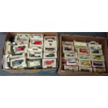 Two boxes of promotional diecast model vehicles, all appearing in original boxes: Lledo, Days Gone