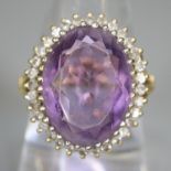 18ct gold amethyst and diamond ring. Size O. 7g approx.