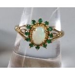 9ct gold opal and green stone ring. 2.2g approx. Ring size N 1/2. (B.P. 21% + VAT)