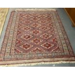 Fine woven hand made Afghan Kazak rug with central lozenge medallions and geometric designs. (B.P.