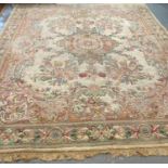 Large Indian cream ground foliate decorated carpet. 385x197cm approx. (B.P. 21% + VAT)