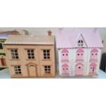 Two modern doll's houses containing assorted furniture, figures and accessories. (B.P. 21% + VAT)