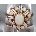 9ct gold opal flower head design ring. 3.6g approx. Ring size P. (B.P. 21% + VAT)