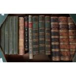Box of antiquarian and vintage books to include: set of three leather bound marbled board Welsh