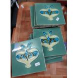 Tray containing ten Art Nouveau organic design green glazed tiles. (10) (B.P. 21% + VAT)