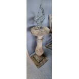 Reconstituted stone baluster shaped pedestal sundial with white metal mount. (B.P. 21% + VAT)