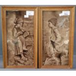 Pair of framed ceramic tiles depicting children on their way to school. 29x14cm approx. Oak