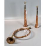 Two copper and silver plate hunting horns, one marked Swain & Adeney, Piccadilly, London together