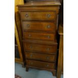 Reproduction mahogany chest on chest having six drawers of narrow proportions. 52x36x116cm