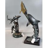 Two modern patinated metal sculptural groups featuring dolphins and mermaid, 34cm and 24cm high