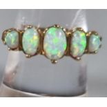 9ct gold five stone opal ring. 3.1g approx. Ring size M 1/2. (B.P. 21% + VAT)