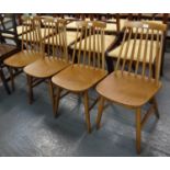 Set of four beech Ercol style Windsor spindle back chairs. (4) (B.P. 21% + VAT)