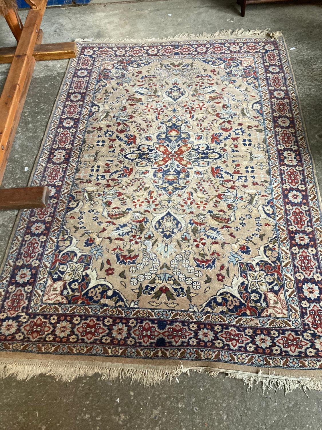Middle Eastern beige ground foliate design rug. 180x127cm approx. (B.P. 21% + VAT)