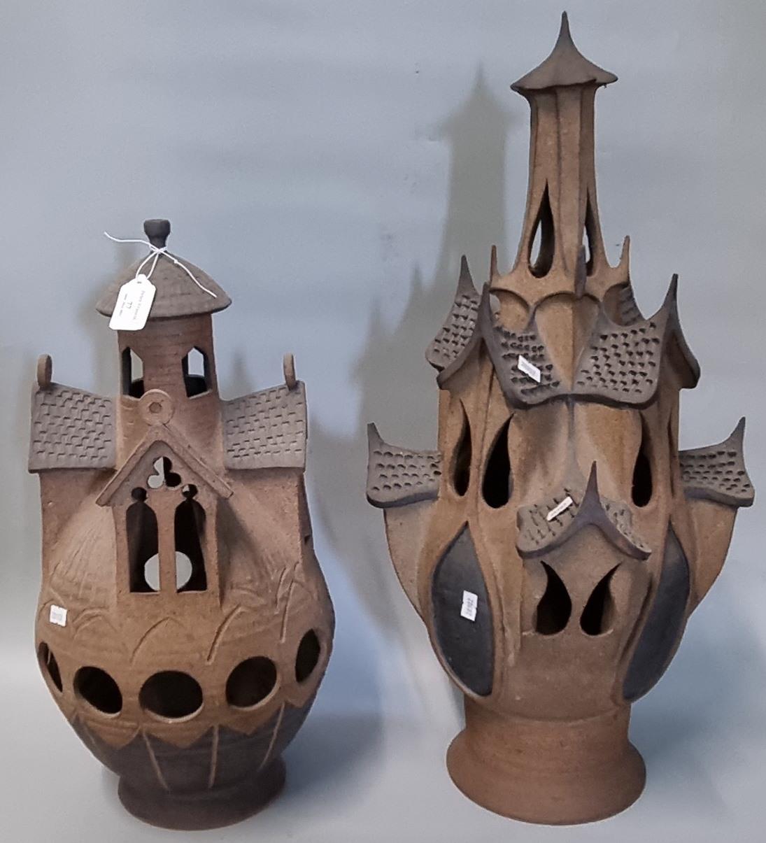 Avondale Pottery, two similar novelty tealight/candle holders in the forms of mythical castles,