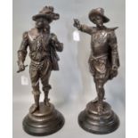 Pair of early 20th century spelter figures, probably Musketeers on circular wooden bases. (2) (B.