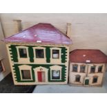 Two mid 20th century Georgian style doll's houses containing an assortment of modern and other