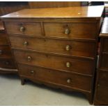 19th century mahogany straight front chest of two short and three long drawers with brass turned