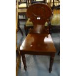 Victorian mahogany hall chair, the shaped bac on moulded seat and ring turned legs. (B.P. 21% + VAT)