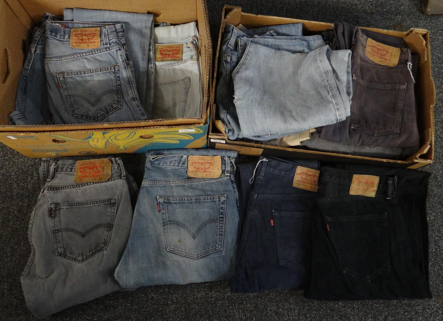 Two boxes of vintage denim Levi Strauss & Co jeans in various sizes and colours. (2) (B.P. 21% +