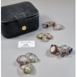 Small ring/jewellery box comprising an assortment of silver and other dress rings with coloured