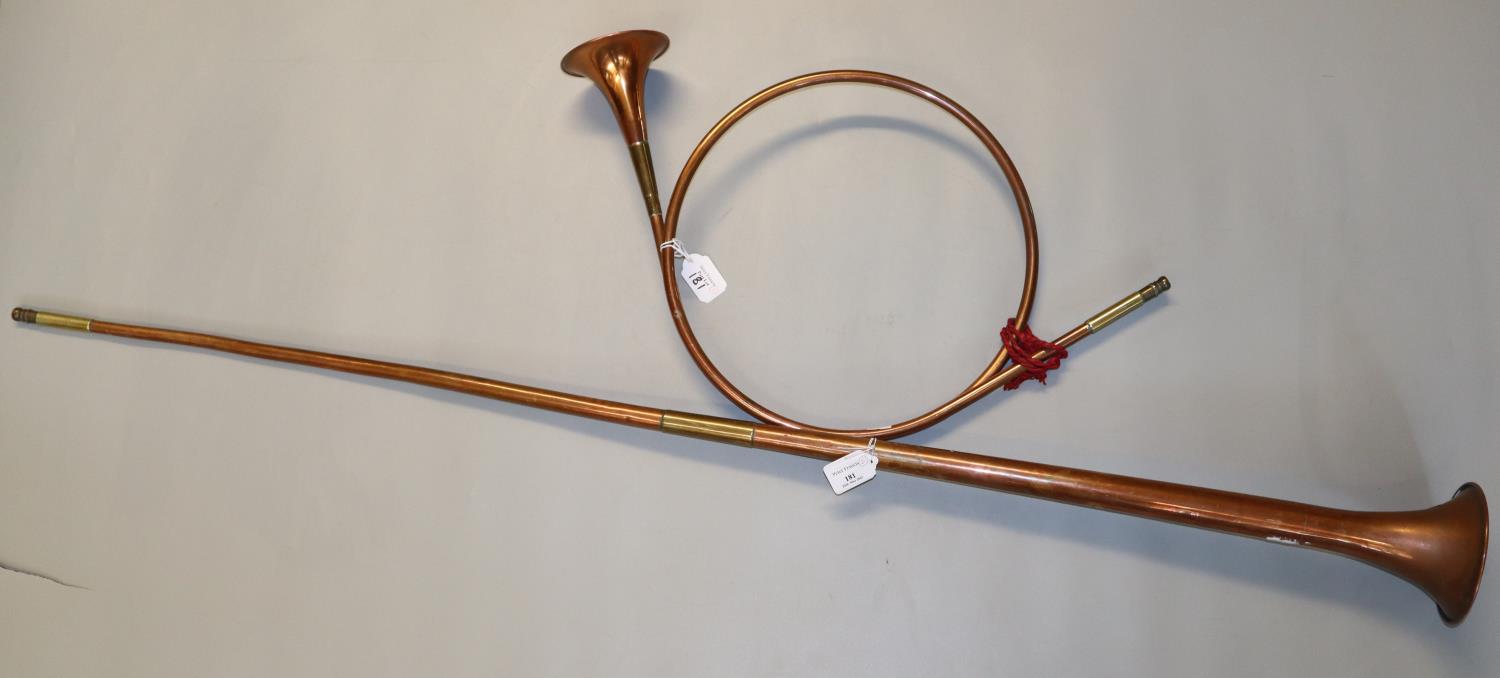 Long copper Post horn together with a French style copper scroll shaped hunting horn. (2) (B.P.