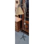 Wrought metal adjustable standard reading lamp with shade. (B.P. 21% + VAT)