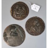 Three patinated metal circular hanging plaques/tablets depicting Virgin Mary with baby Jesus (2)