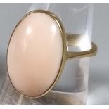 18ct gold and probably pink agate cabochon stone ring. 7.8g approx. Ring Size O 1/2. (B.P. 21% +