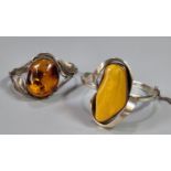 Butterscotch amber silver bracelet together with another amber silver bracelet. (2) (B.P. 21% + VAT)