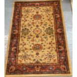 Small Middle Eastern design beige ground floral and foliate multi coloured carpet. 100x146cm approx.
