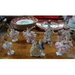 Tray of six continental porcelain figurines mainly ladies in crinoline dresses; two Alka West German