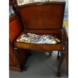 Early 20th century walnut bow front cased canteen of cutlery on stand with ball and claw feet. (B.P.