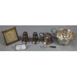 White metal fluted cream jug together with a silver three piece condiment set, EPNS salt spoon and