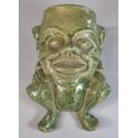 Unusual green glazed pottery grotesque mythical figure wall pocket, the reverse marked P. Gibson '