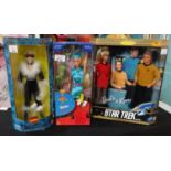 Three Barbie dolls, to include: Toy Story 2, Marvel Comics Black Cat and Barbie and Ken Star Trek