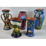 Collection of pottery hand painted vases decorated with flowers and birds to include: Danico