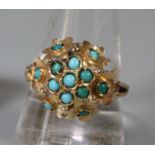 Yellow metal and turquoise stone dress ring. 4.2g approx. Size S 1/2. (B.P. 21% + VAT)