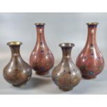 Two pairs of probably Chinese Cloisonné baluster shaped vases with stylised foliate and flowerhead